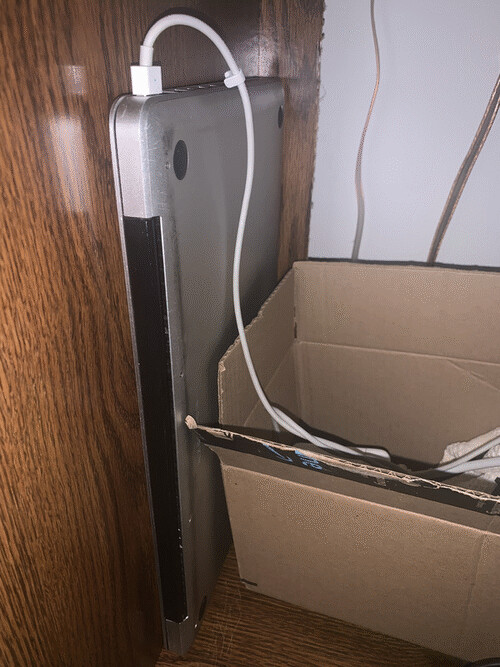 currently propped up by the box i use to ferment tempeh. maybe i can ditch the heating pad i use in the winter and just use the bottom of the macbook?